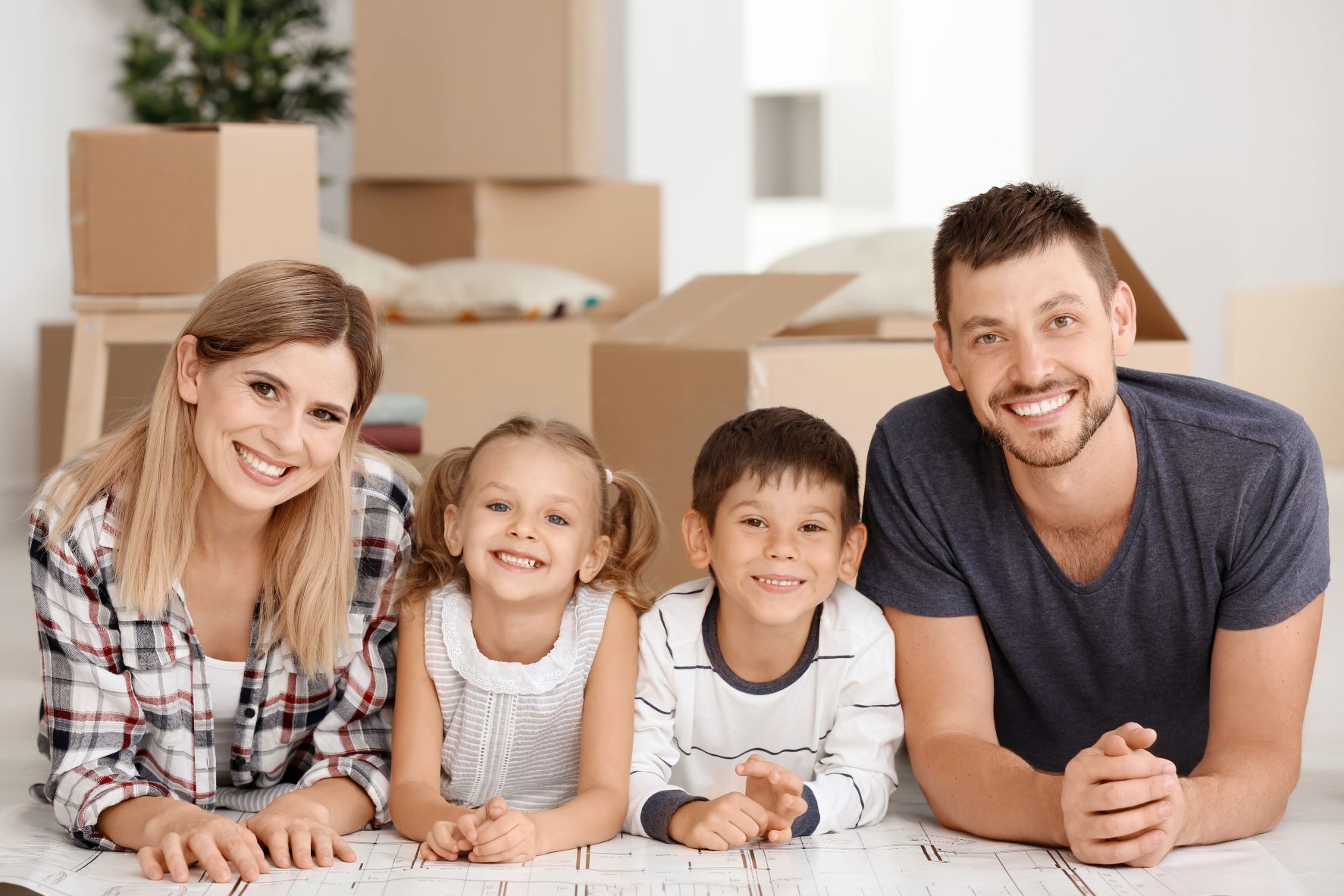 Setting List Price Family of 4 Sitting on Floor Setting List Price Family of 4 Sitting on Floor
